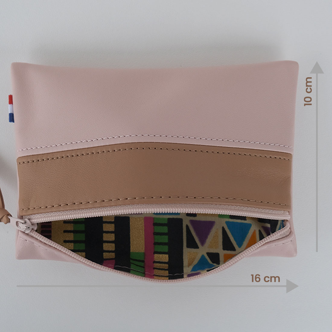 Pochette zippée rectangulaire en cuir d'agneau format midi coloris rose poudré caramel