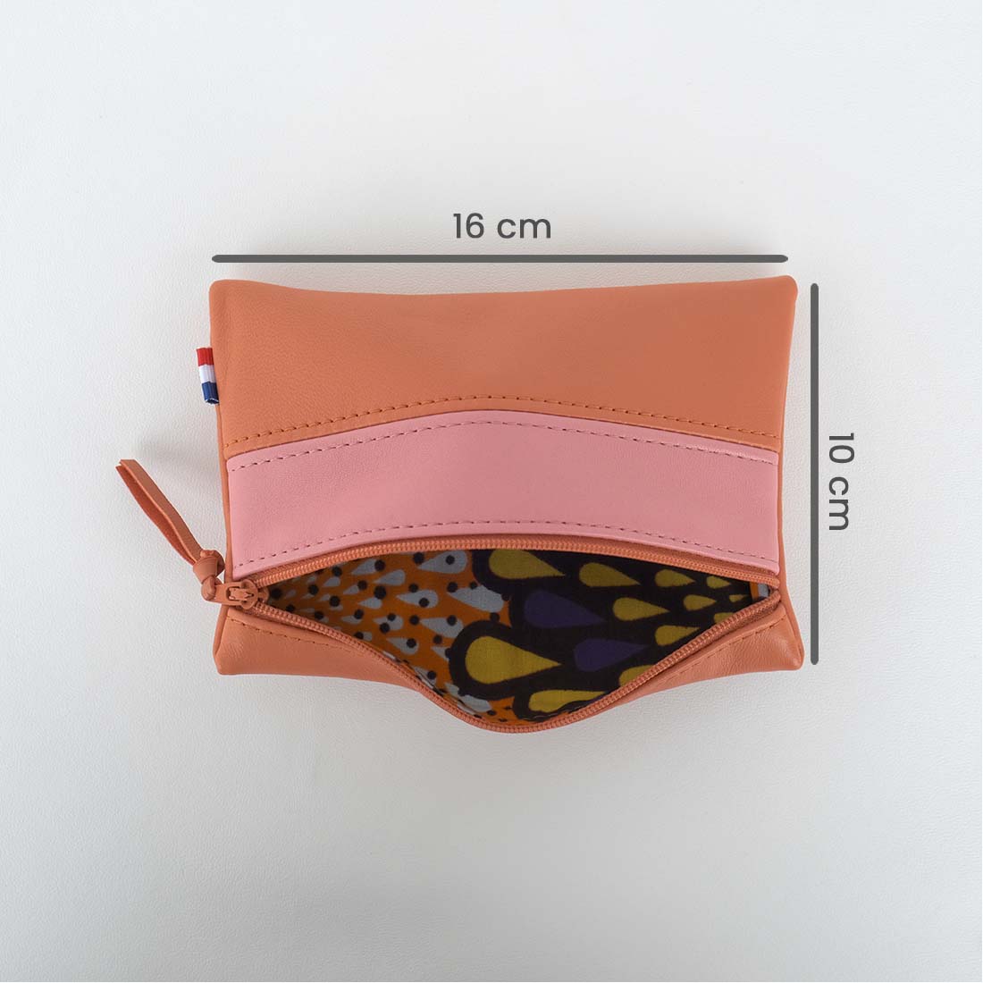 Pochette en cuir d'agneau coloris citrouille praline