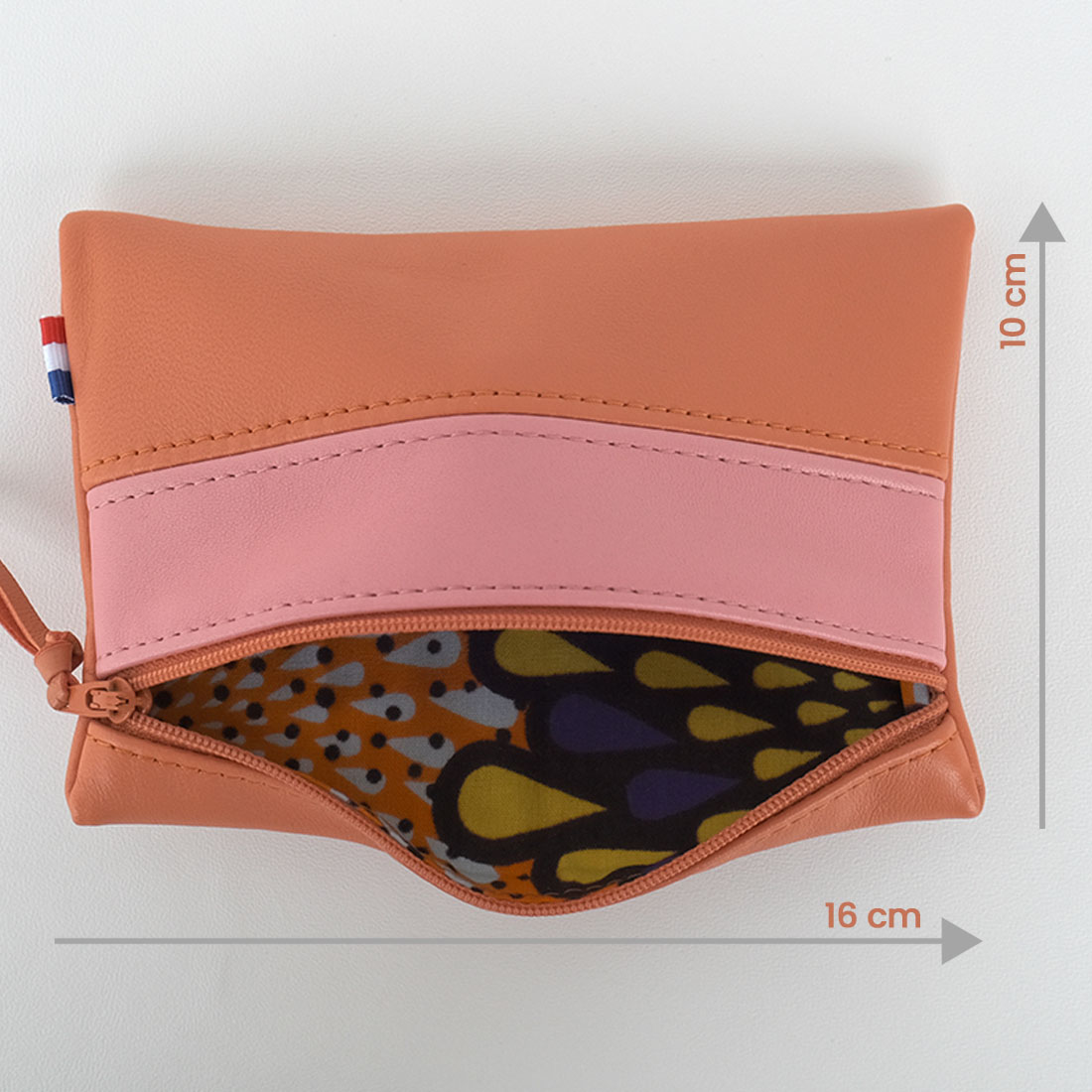 Pochette zippée rectangulaire en cuir d'agneau format midi coloris citrouille rose praline