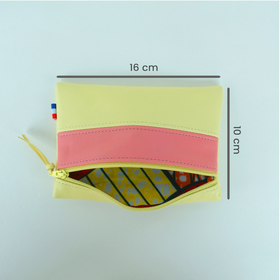 Pochette en cuir d'agneau coloris concombre praline