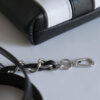 Micro tote bag en cuir bicolore noir blanc Micro tote bag en cuir d'agneau bicolore noir blanc