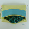 Pochette zippée rectangulaire en cuir d'agneau format mini bicolore vert anis turquoise